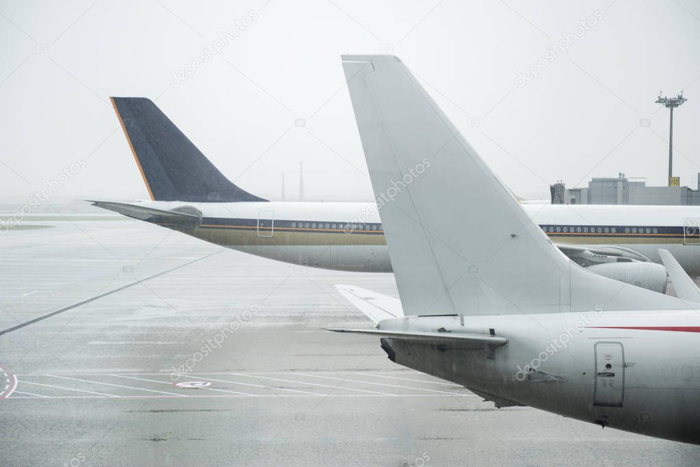 Aircraft airplanes landed in airport, plane wings 