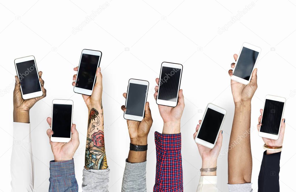 cropped image of people holding mobile phones 