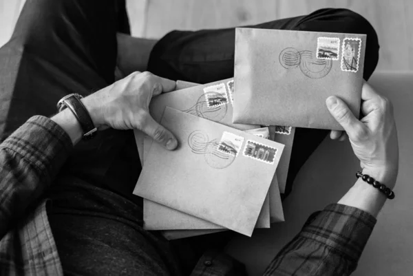 Aerial View Man Selecting Envelopes — Stock Photo, Image