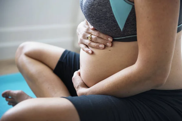 Pregnant Woman Siting Yoga Mat Touching Belly — Stock Photo, Image