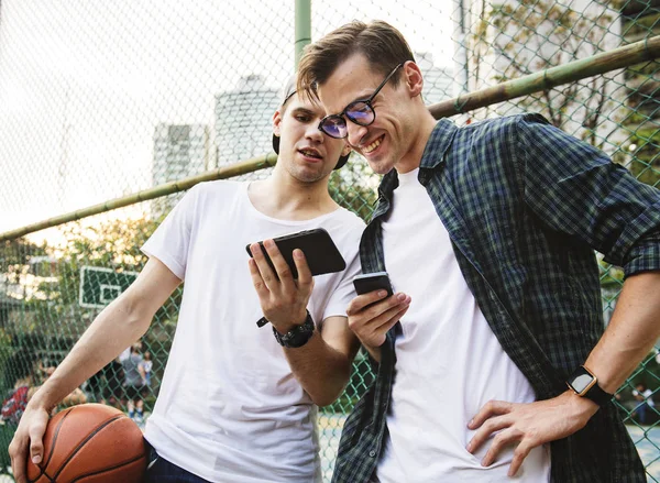Young Adult Male Friends Basketball Court Using Smartphones Millennials Concept — Stock Photo, Image