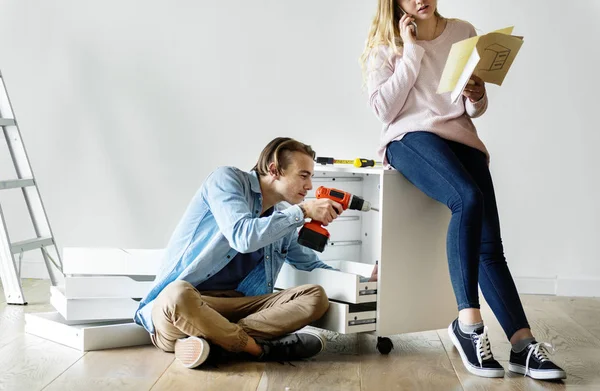 Man Using Electronic Drill Install Cabinet — Stock Photo, Image