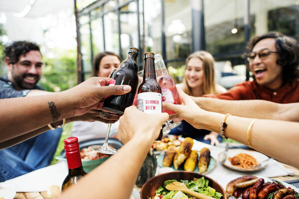 Group of friends toasting together