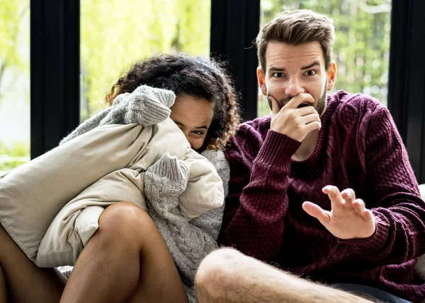 Young Couple Watching Scary Movie Together — Stock Photo, Image