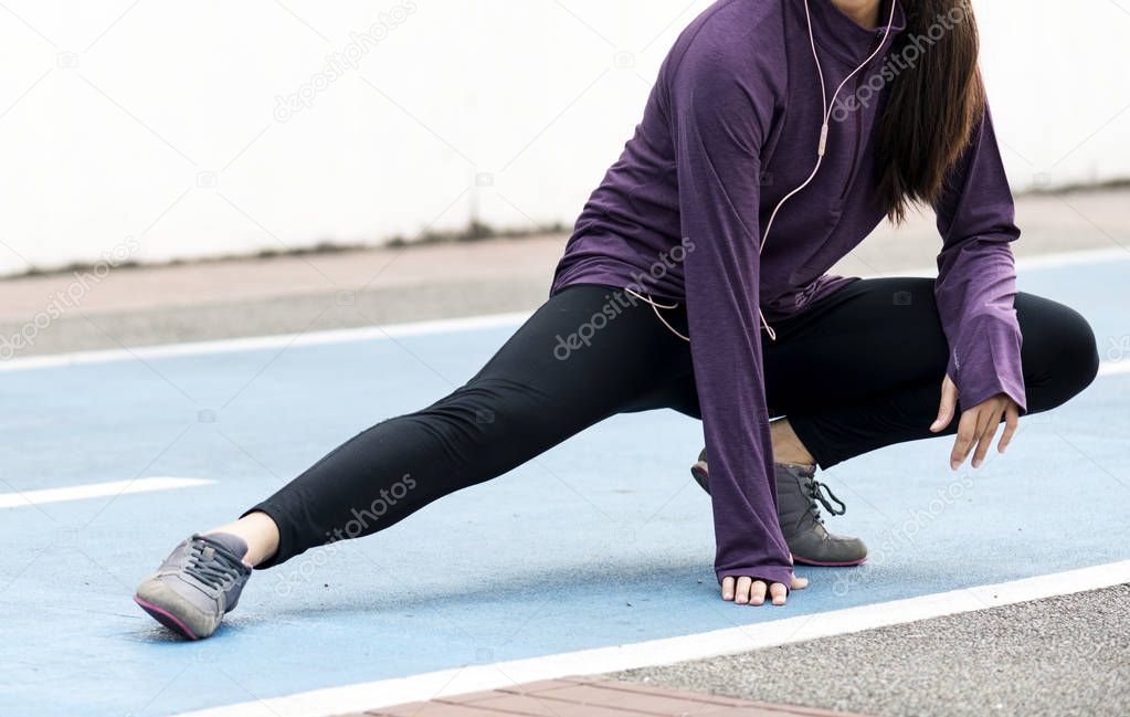 woman stretching before exercise