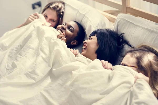 Group Diverse Women Lying Bed Together Blanket — Stock Photo, Image