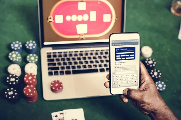 Person Using Mobile Phone Table Casino Laptop Table — Stock Photo, Image