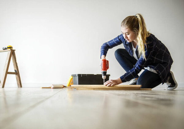 woman renovating the house concept