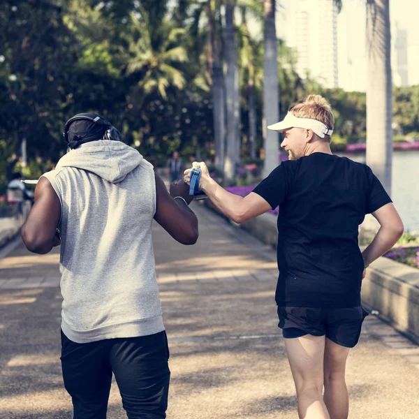 Two Men Jogging Park Royalty Free Stock Photos