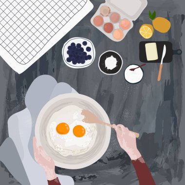 Baker mutfakta yemek pişiriyor.