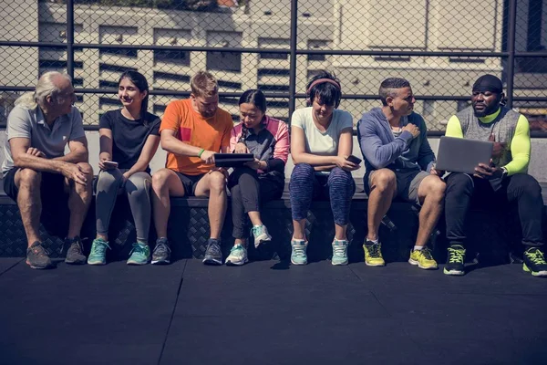 Stock image Group of diverse people using digital devices