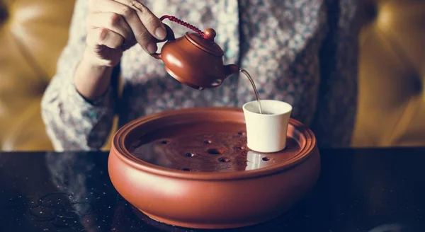 Woman Pouring Tea Cup — Stock Photo, Image