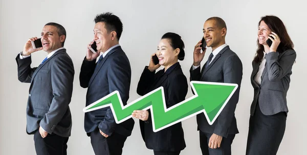 Business People Suits Holding Green Profit Arrow Talking Phones — Stock Photo, Image