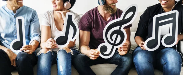 People Holding Musical Icons — Stock Photo, Image
