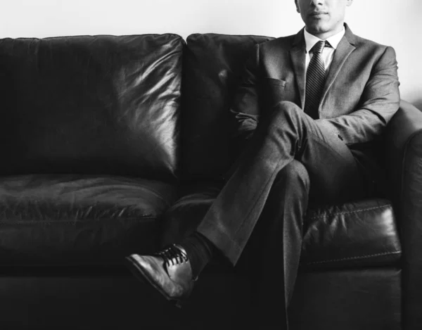 Businessman Suit Sitting Leather Sofa — Stock Photo, Image