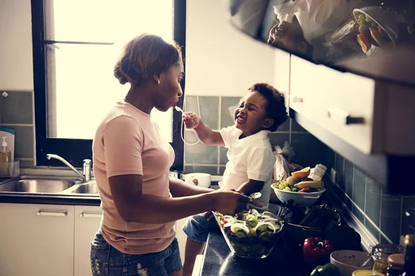 Kid Feeding Mom Kitchen — Stock Photo, Image