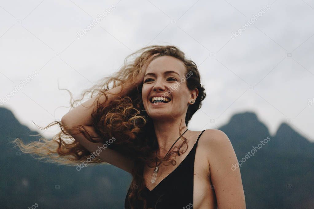 Blond woman enjoying the summer breeze