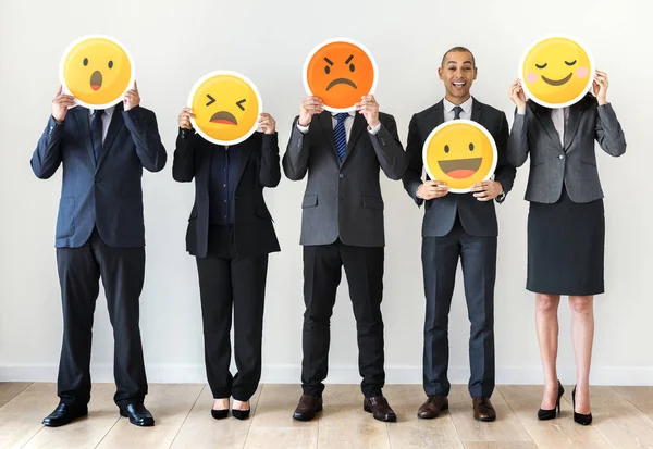 people holding yellow emoticon icons, smiles characters