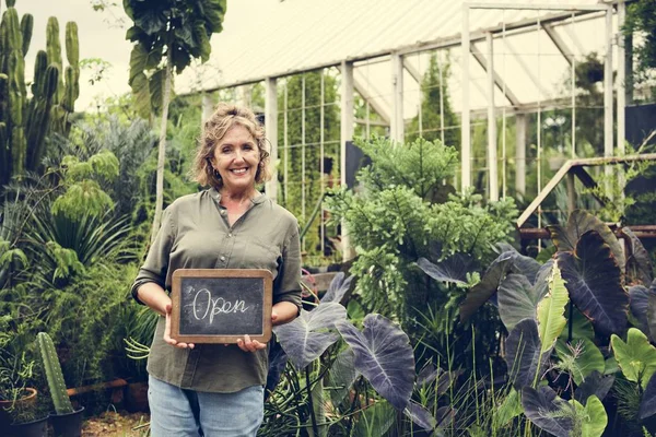 Adult Woman Holding Open Sign Looking Camera — Stock Photo, Image