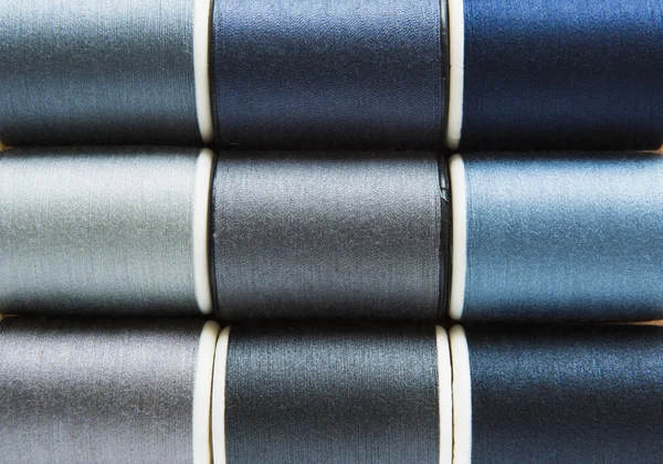 Shades Gray Blue Sewing Threads Background Closeup — Stock Photo, Image