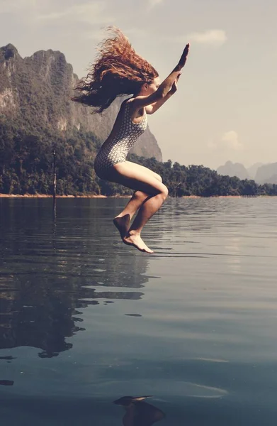 Woman Jumping Water — Stock Photo, Image