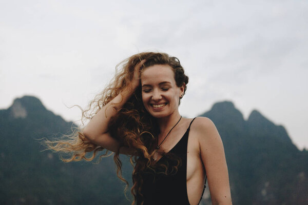 Blond woman enjoying the summer breeze