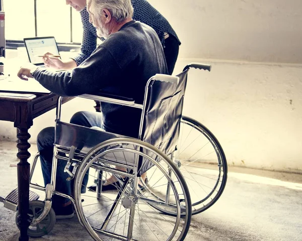 Side View Elderly Man Sitting Wheelchair Looking Life Insurance Contract — Stock Photo, Image