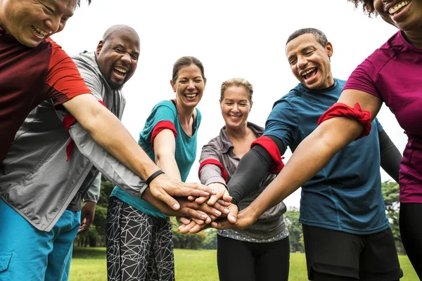 Equipo Diverso Apilando Sus Manos — Foto de Stock