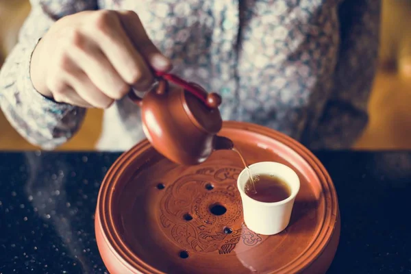 Woman Pouring Tea Cup — Stock Photo, Image