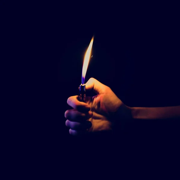 Hand Holding Lit Lighter Dark — Stock Photo, Image