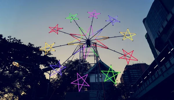 Star Shaped Neon Windmill Festival — Stock Photo, Image