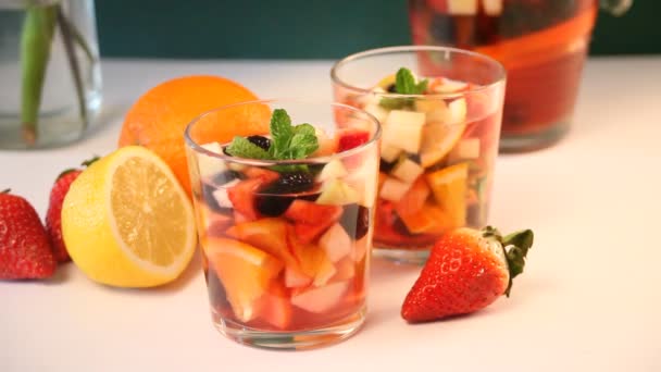 Woman Hand Take Glass Red Wine Fresh Sangria Punch Fruits — Stock Video