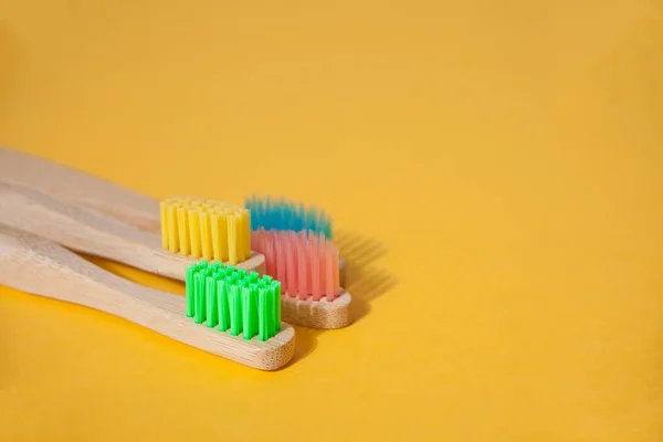 Eco Bamboo Kid Colorful Toothbrushes Yellow Background Copy Space — Stock Photo, Image