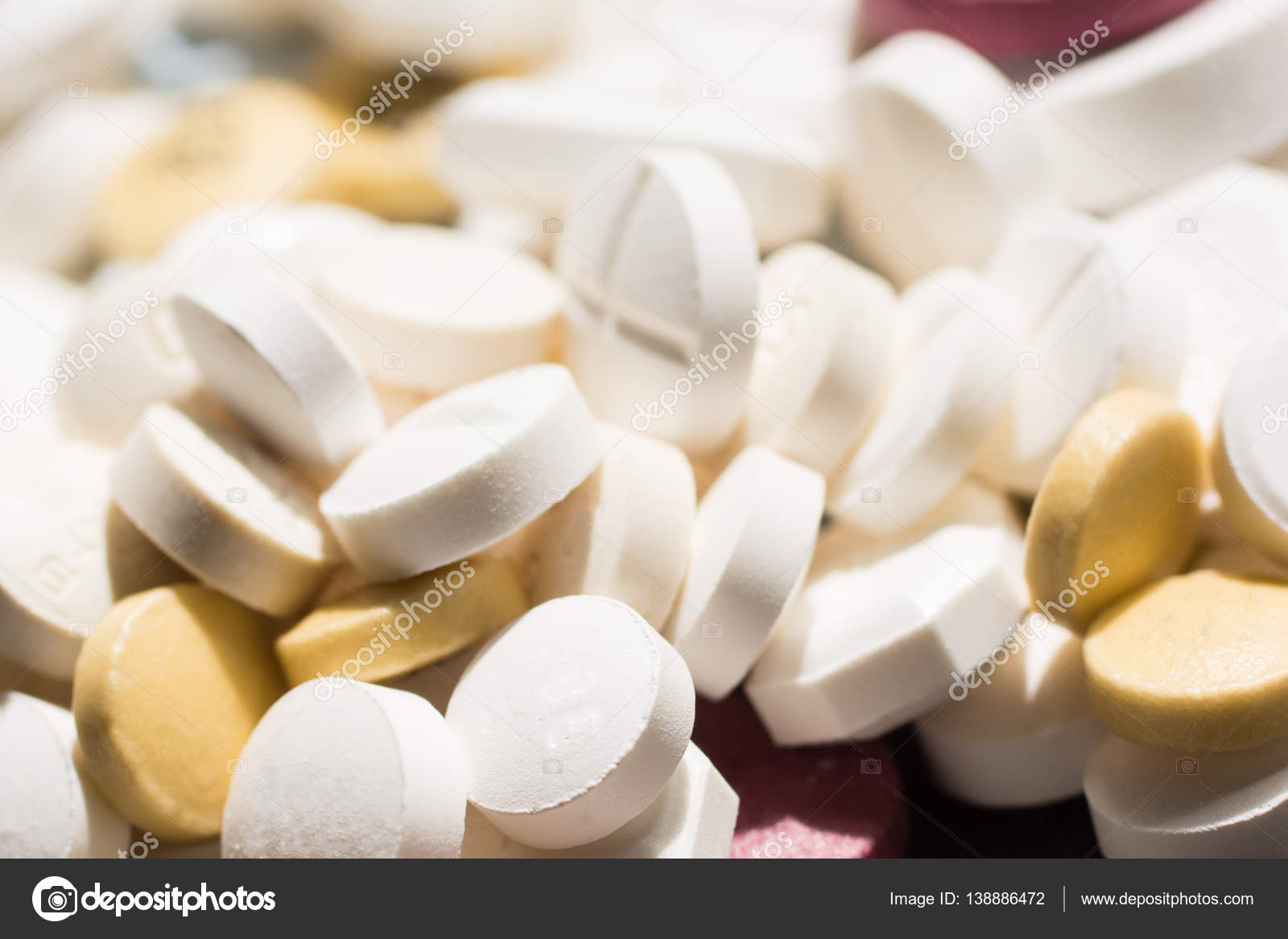 Multiple pills depicting medical treatment or pahrmaceutical ind