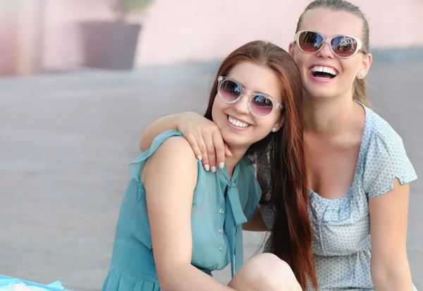 Portrait of two young positive woman having fun — Stock Photo, Image