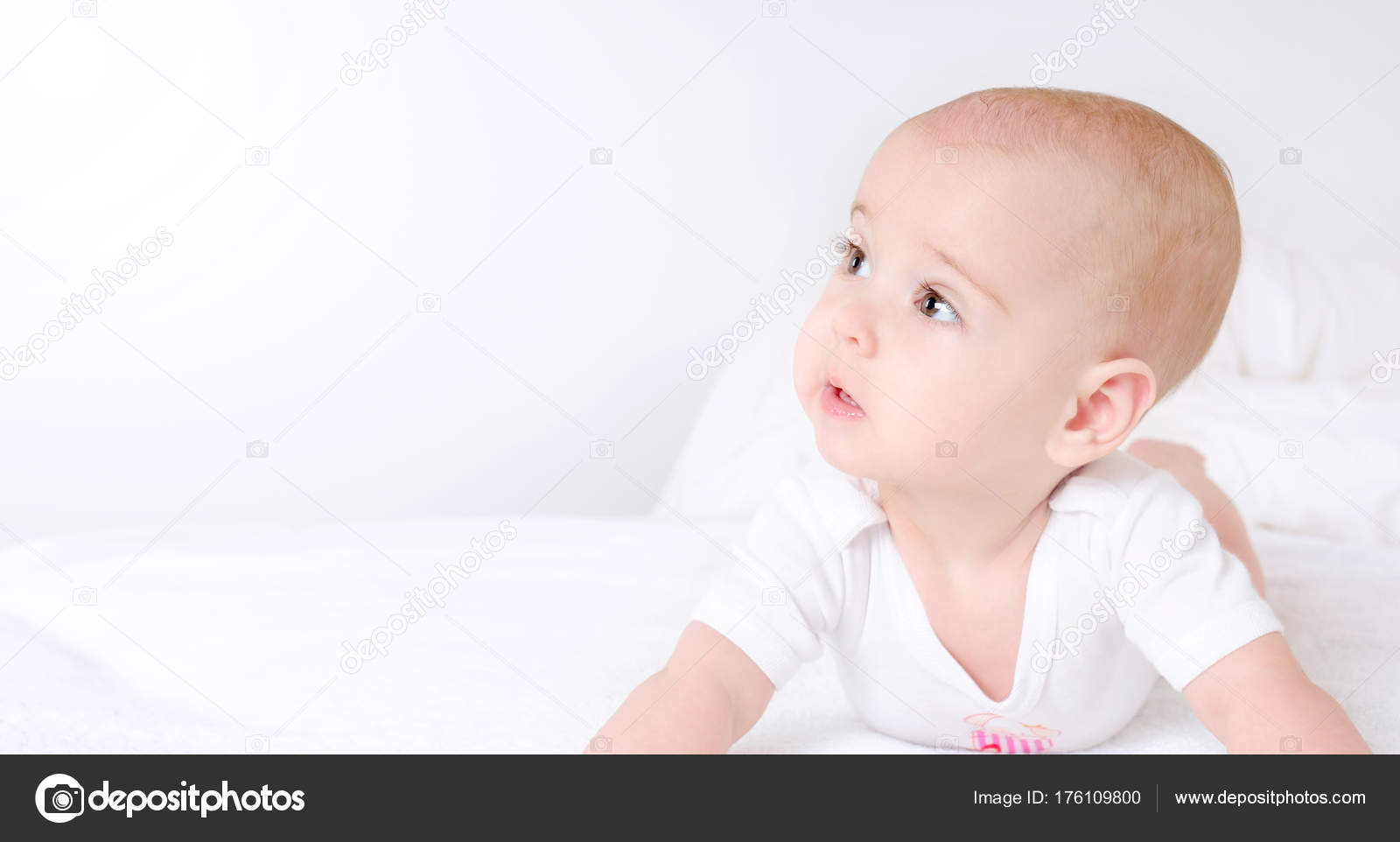 Cute Babies With Brown Eyes Cute Baby With Beautiful Brown Eyes Lying In White Bed Stock Photo C Misfire 176109800