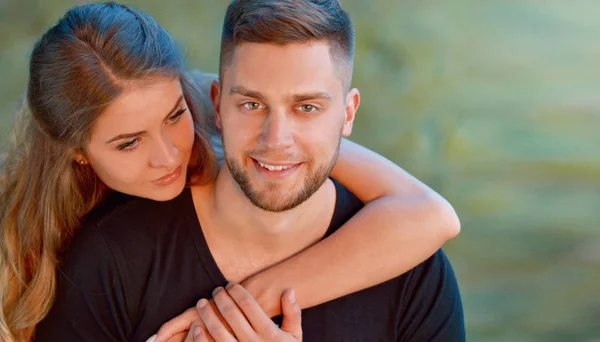 Young happy smiling attractive couple together outdoors — Stock Photo, Image