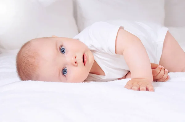 Peaceful Baby Lying On A Bed While Sleeping In A Bright Room Portrait Soft Stock Photo