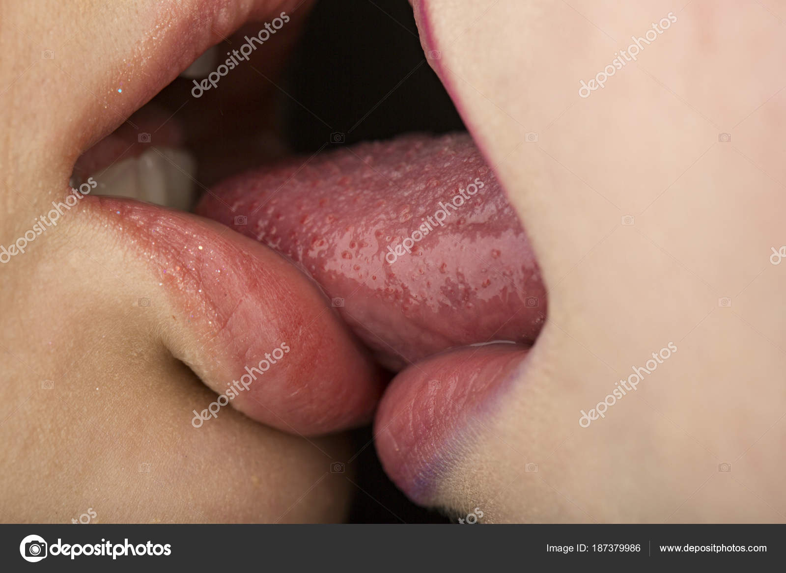 Tongue in lesbian girl mouth, sexy homosexual concept. French Kiss pic