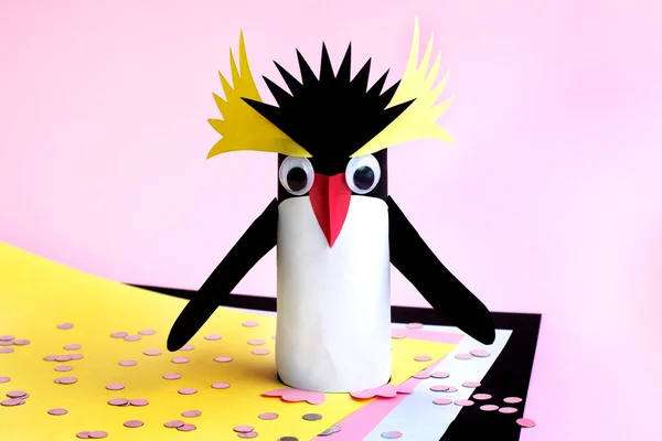 Making a penguin from colored paper and a roll of toilet paper. Children\'s art project. Step by step photo instruction. Step 10. Final result.