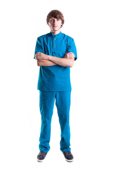 Lekarz medycyny w niebieskim mundurze na białym tle — Zdjęcie stockowe