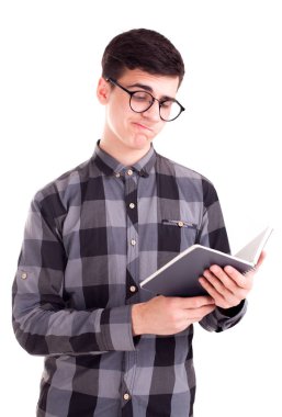 Öğrenci çocuk izole Not Defteri'nde ders okuma