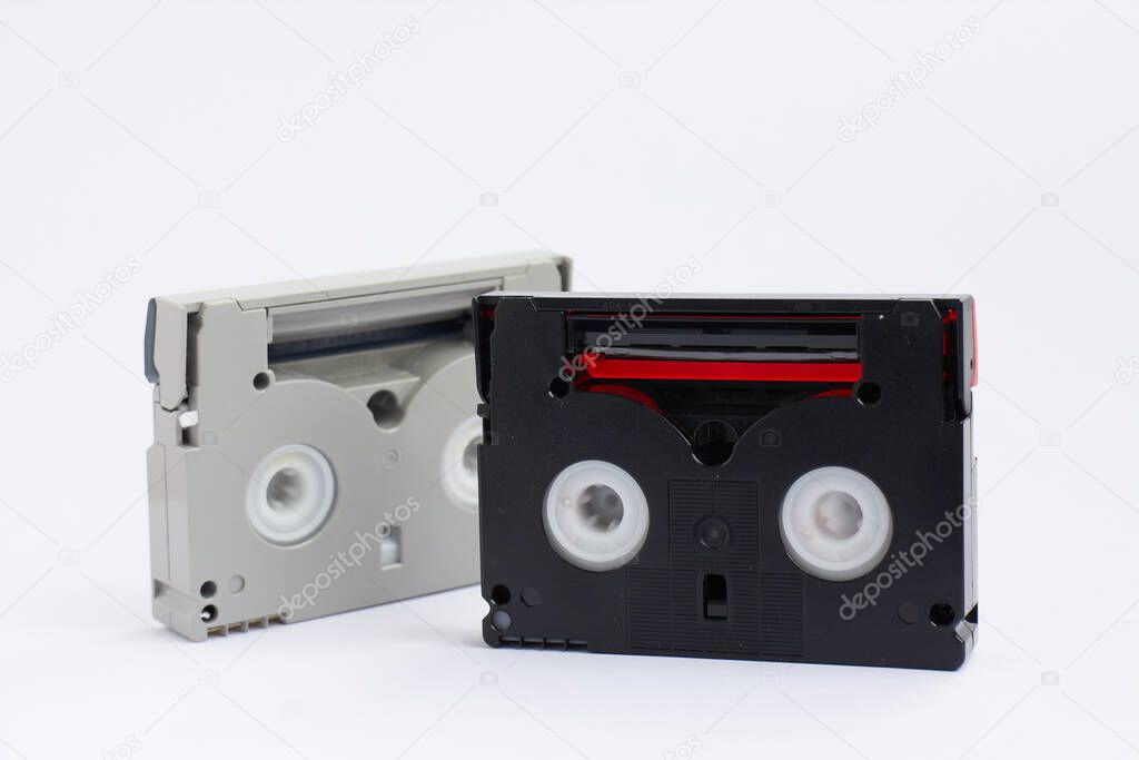 mini dv tapes on white background