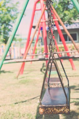 swing on blurredbackground , vintage tone photo