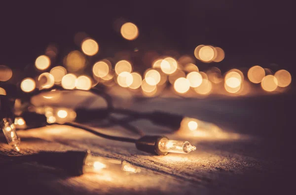 Noel ışık dekor ahşap arka plan, renk filtresi vintage 