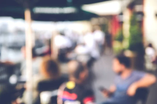 Wazig achtergrond gemaakt met Vintage Tones, Koffie winkel wazig achtergrond met bokeh — Stockfoto