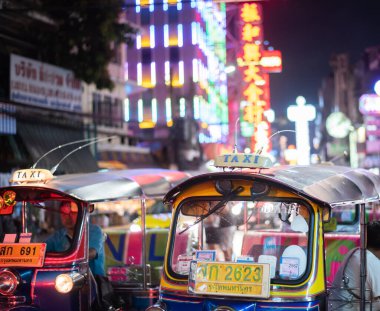 BANGKOK, THAILAND - may 4:Unidentified male driver of Tuk Tuk or 3-wheeled taxi,waiting passenger to trips tour at china town on may 4 2019