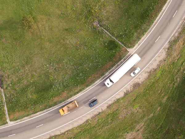 Aerial top down drone shot. Lorry truck on the highway.