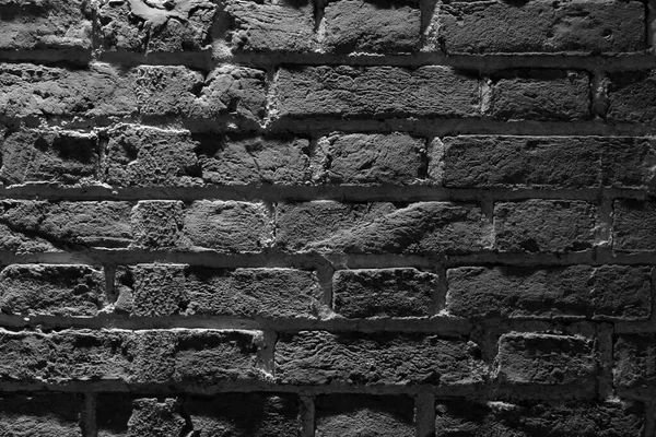 黑色砖墙纹理背景 老旧破瓦墙体的风化模式 堆石墙粗糙的表面 老旧的磨擦表面 复古墙纸 材料设计 — 图库照片