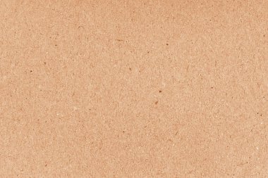 Kahverengi kumlu karton yüzey. Bej karton düz yüzey. Tahıl kağıdı dokusu. Paketlemek için karton kutu. Karton grunge lifli ve tahıllı geri dönüştürülmüş kağıt dokusu